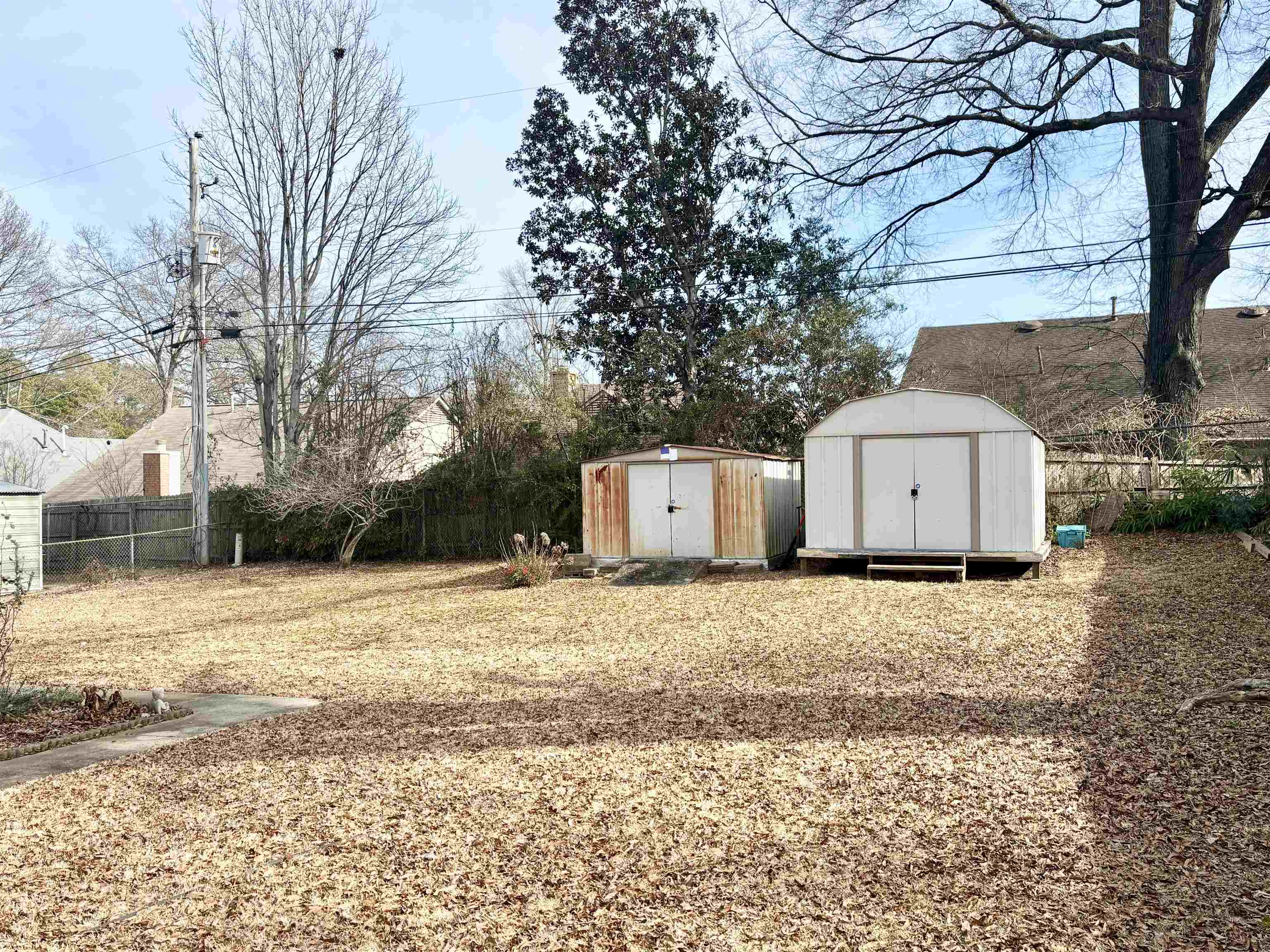 496 Chalmers Road Memphis, TN 38120 - Photo 19 of 20 View of yard featuring a shed