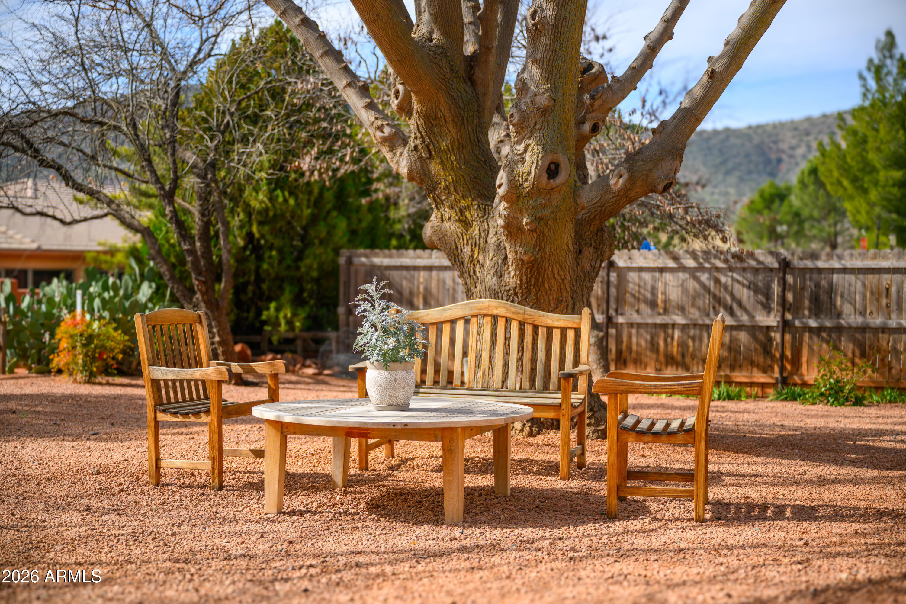 190 Creek Rock Road Sedona, AZ 86351 - Photo 32 of 41 a view of a chairs and table in the patio