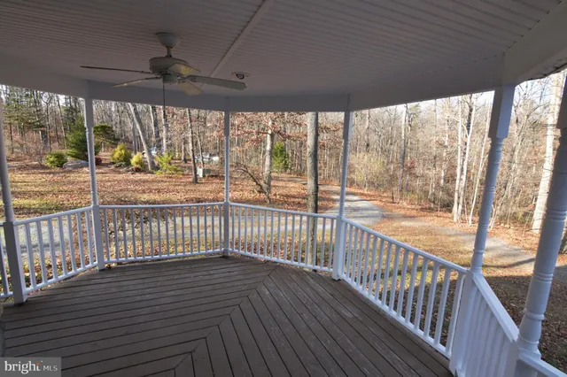 a view of fireplace with wooden floor