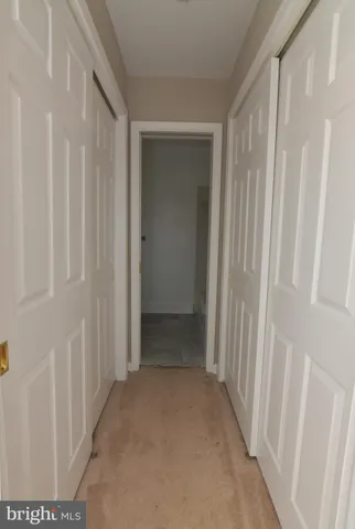 a bathroom with a sink a mirror and a shower