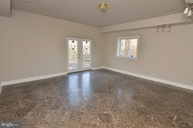a view of large house with a large trees in front of it