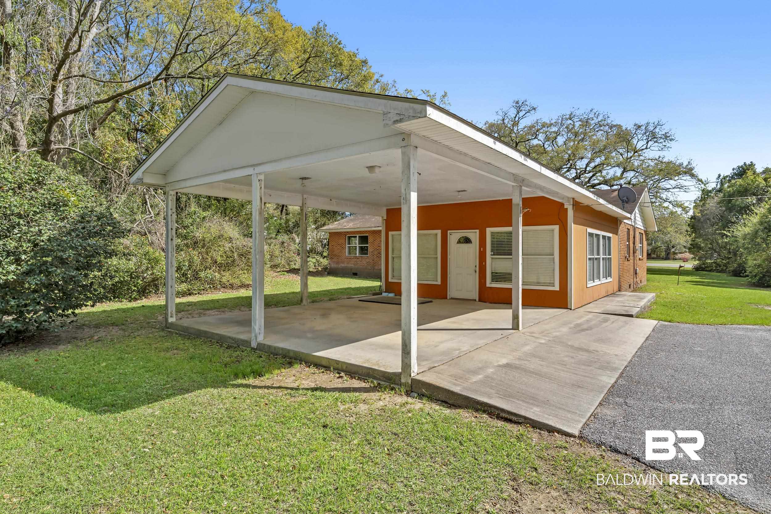 17463 Highway 98 Foley, AL 36535 - Photo 20 of 57 View of patio with an attached carport