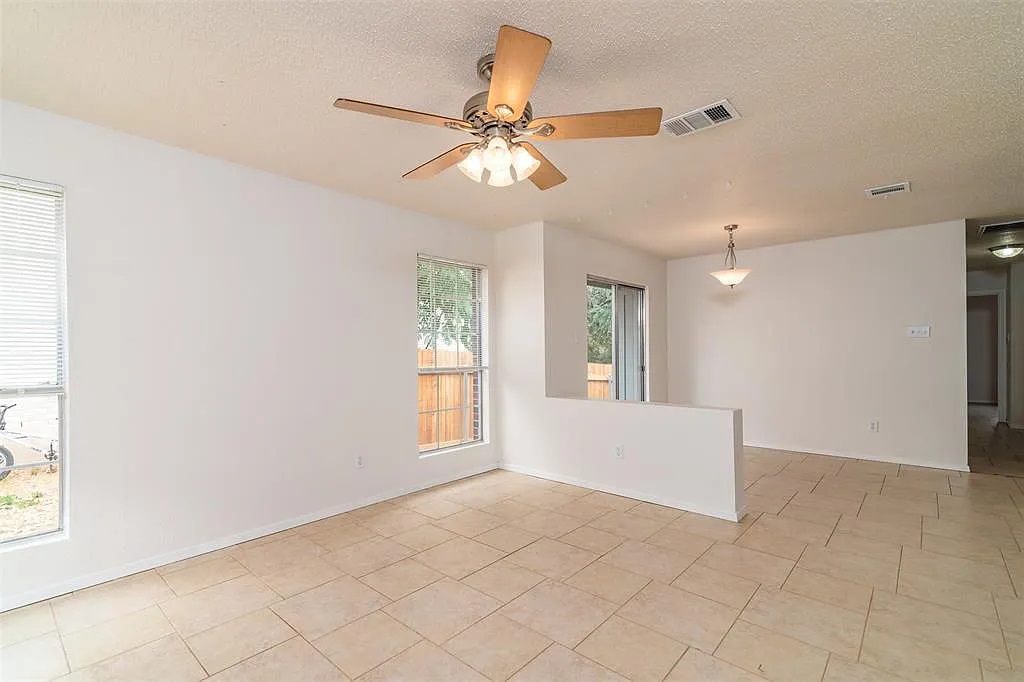 7229 Aldea Drive, Unit B Austin, TX 78745 - Photo 2 of 13 a view of an empty room with a window