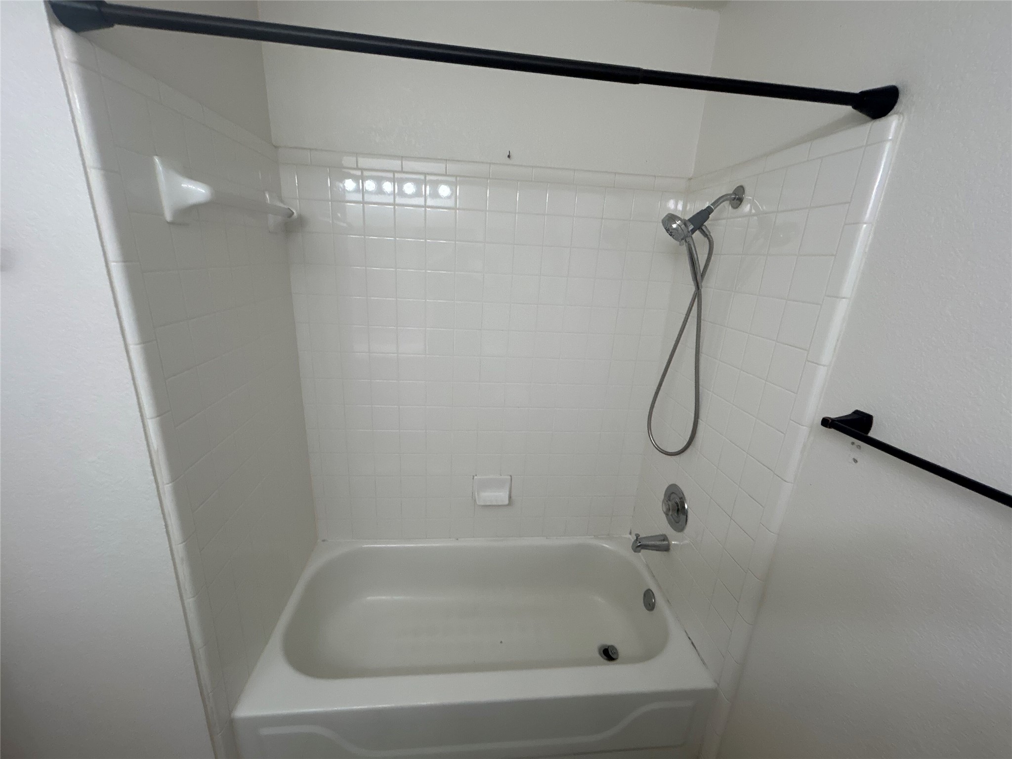 7229 Aldea Drive, Unit B Austin, TX 78745 - Photo 7 of 13 a close view of a bathtub in bathroom
