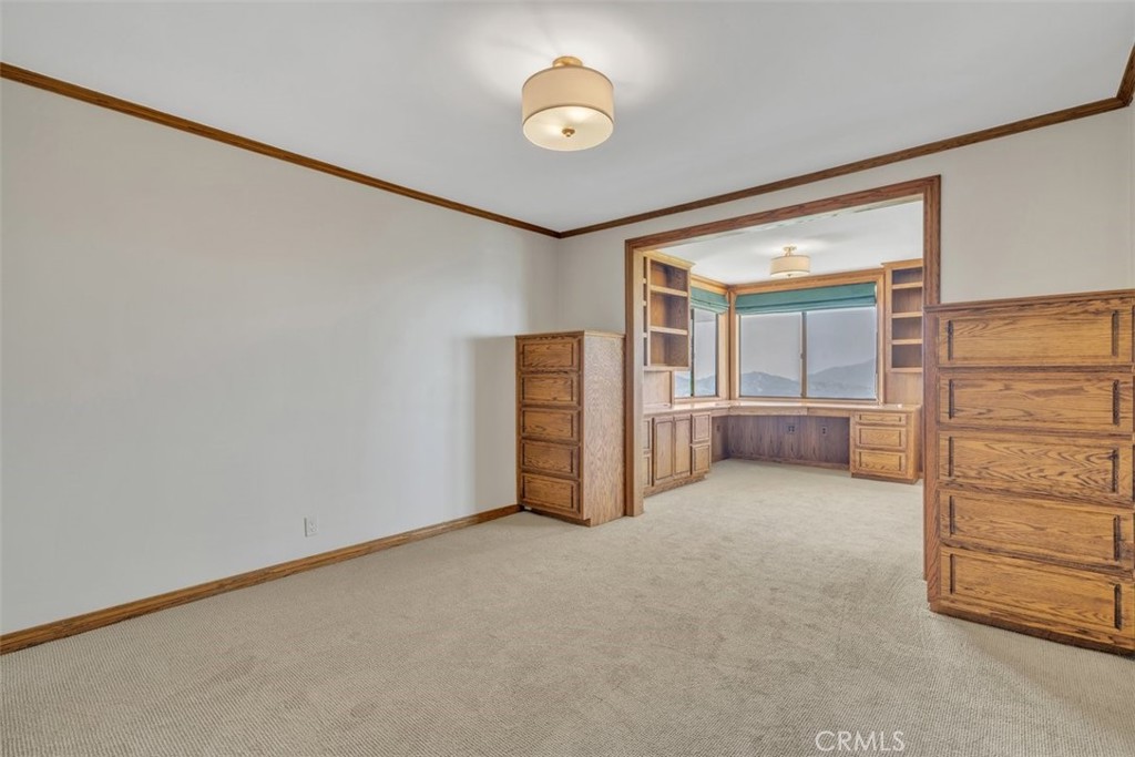 5441 Burning Tree Drive La Canada Flintridge, CA 91011 - Photo 15 of 32 an empty room with closet and mirror