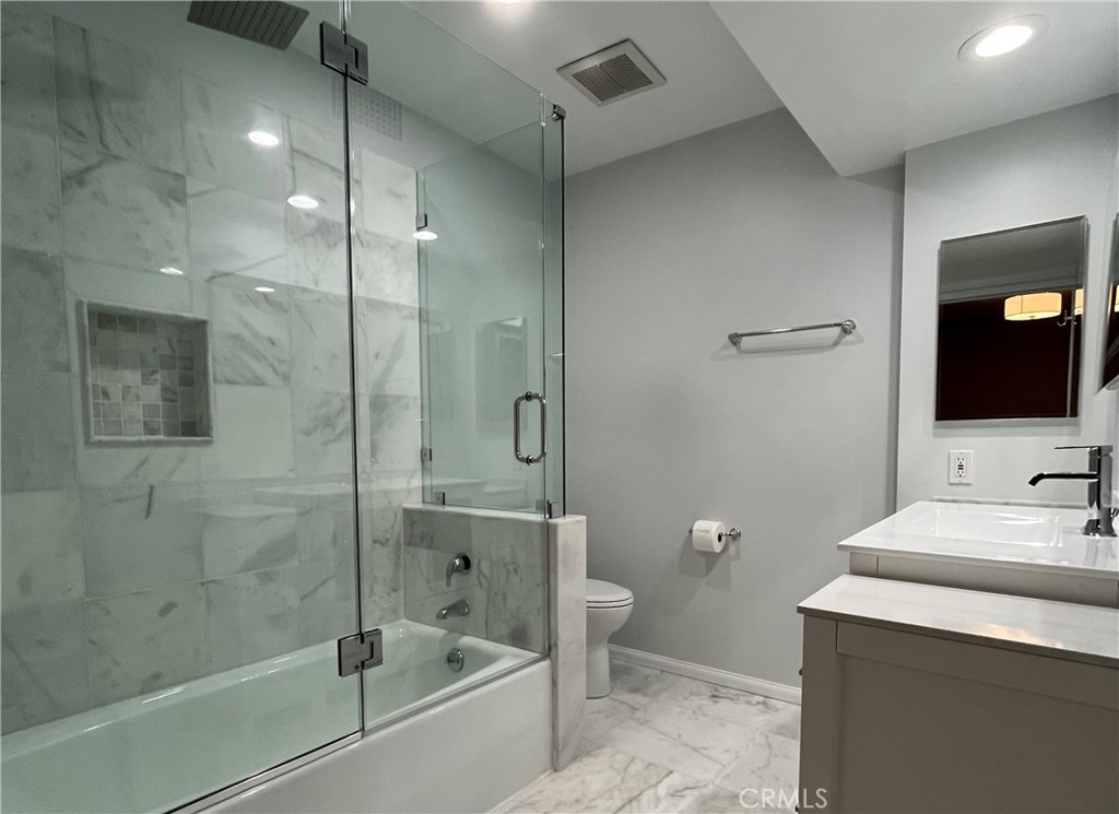 5441 Burning Tree Drive La Canada Flintridge, CA 91011 - Photo 16 of 32 a bathroom with a sink a toilet and shower