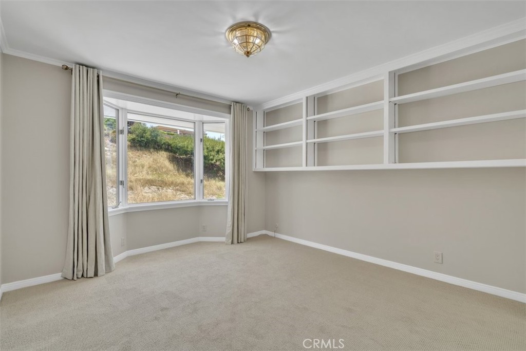 5441 Burning Tree Drive La Canada Flintridge, CA 91011 - Photo 18 of 32 a view of an empty room with a window