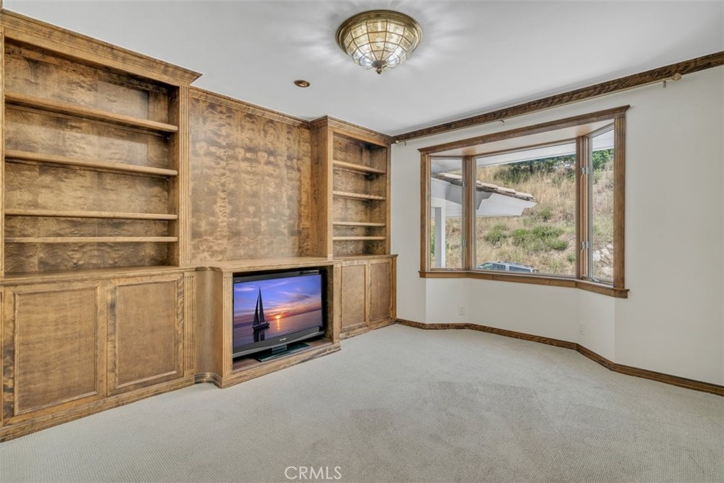 5441 Burning Tree Drive La Canada Flintridge, CA 91011 - Photo 21 of 32 a view of an empty room with a window