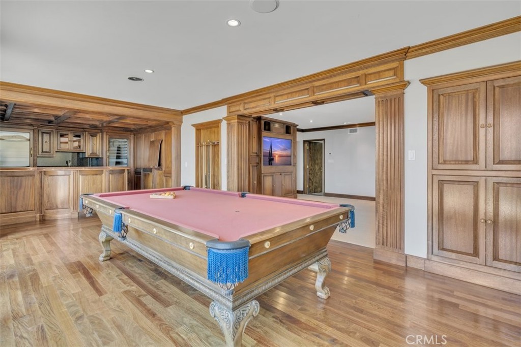 5441 Burning Tree Drive La Canada Flintridge, CA 91011 - Photo 23 of 32 a room with pool table and wooden floor