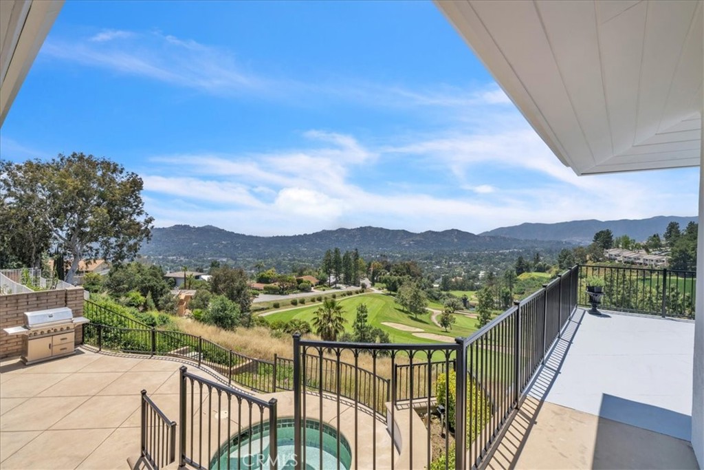 5441 Burning Tree Drive La Canada Flintridge, CA 91011 - Photo 29 of 32 a view of a city from a balcony
