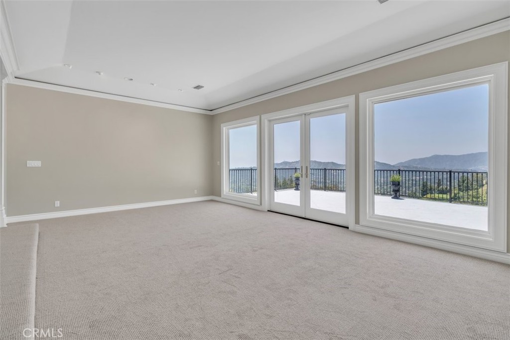 5441 Burning Tree Drive La Canada Flintridge, CA 91011 - Photo 5 of 32 a view of an empty room with a window