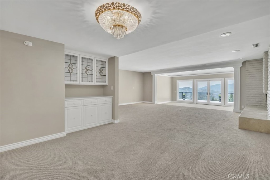 5441 Burning Tree Drive La Canada Flintridge, CA 91011 - Photo 7 of 32 an empty room with a empty space and windows