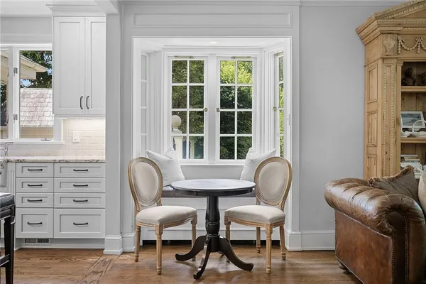 a view of a livingroom with furniture and windows