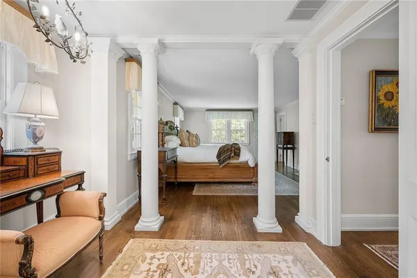a living room with furniture and a table