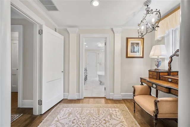 a bedroom with furniture and a window