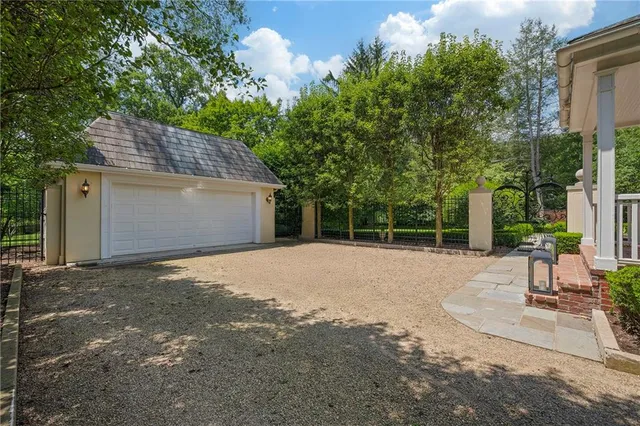 a house with trees in the background
