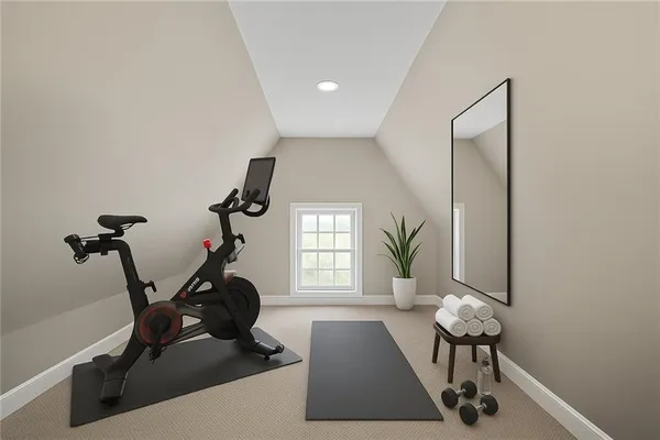 a room with gym equipment and a window