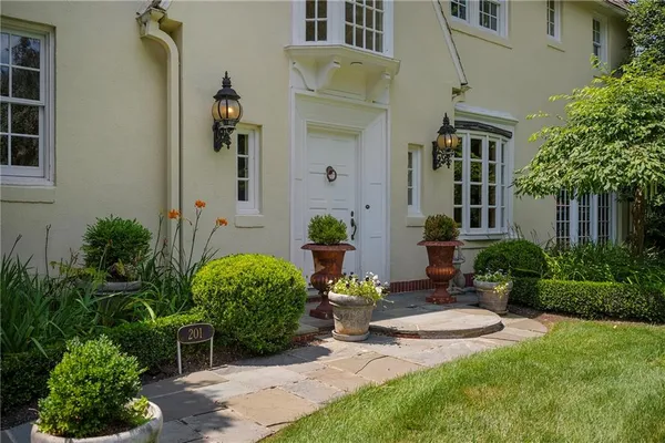 front view of a house with a yard