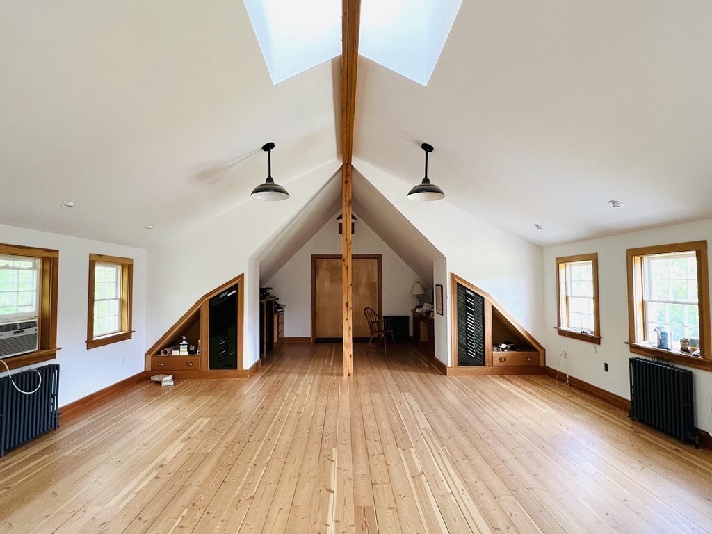 19 Main Street Boxford, MA 01921 - Photo 19 of 25 a view of entryway and hall with wooden floor