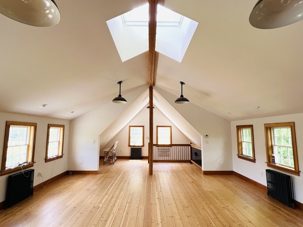 19 Main Street Boxford, MA 01921 - Photo 20 of 25 a view of entryway and hall with wooden floor