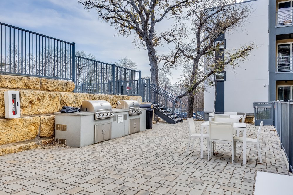 4801 Springdale Road, Unit 2107 Austin, TX 78723 - Photo 25 of 26 a view of a patio with open kitchen