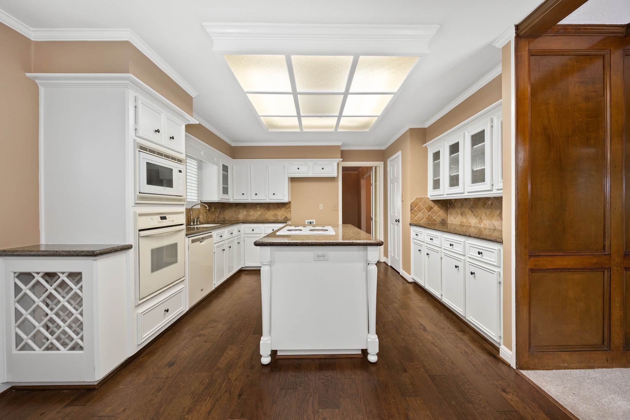 6623 Ampton Drive Spring, TX 77379 - Photo 16 of 45 This is a very large kitchen and the island adds so much to the room where everyone likes to gather.