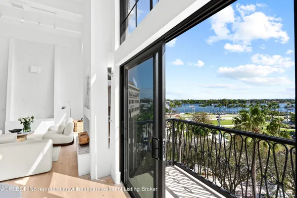 a view of a balcony with furniture