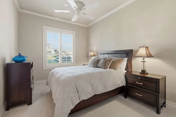 a bathroom with double vanity sinks and a mirror