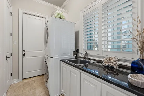 a bathroom with a sink a mirror and shower