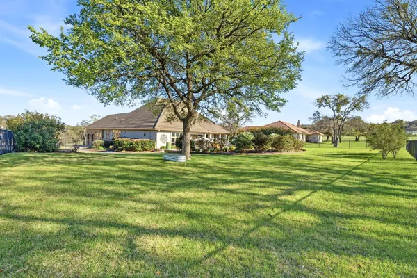 an aerial view of a house with swimming pool