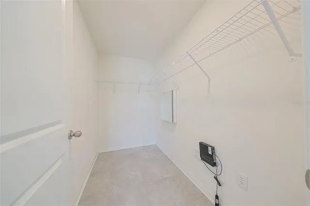 a view of a room with racks on the wall