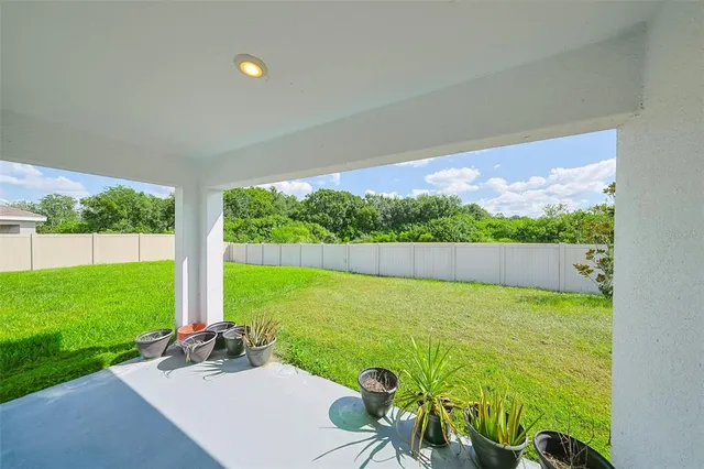 a view of back yard of the house