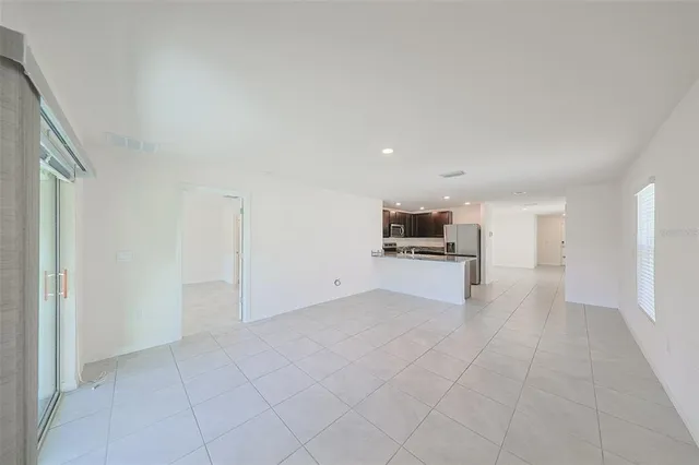 a view of kitchen with natural light