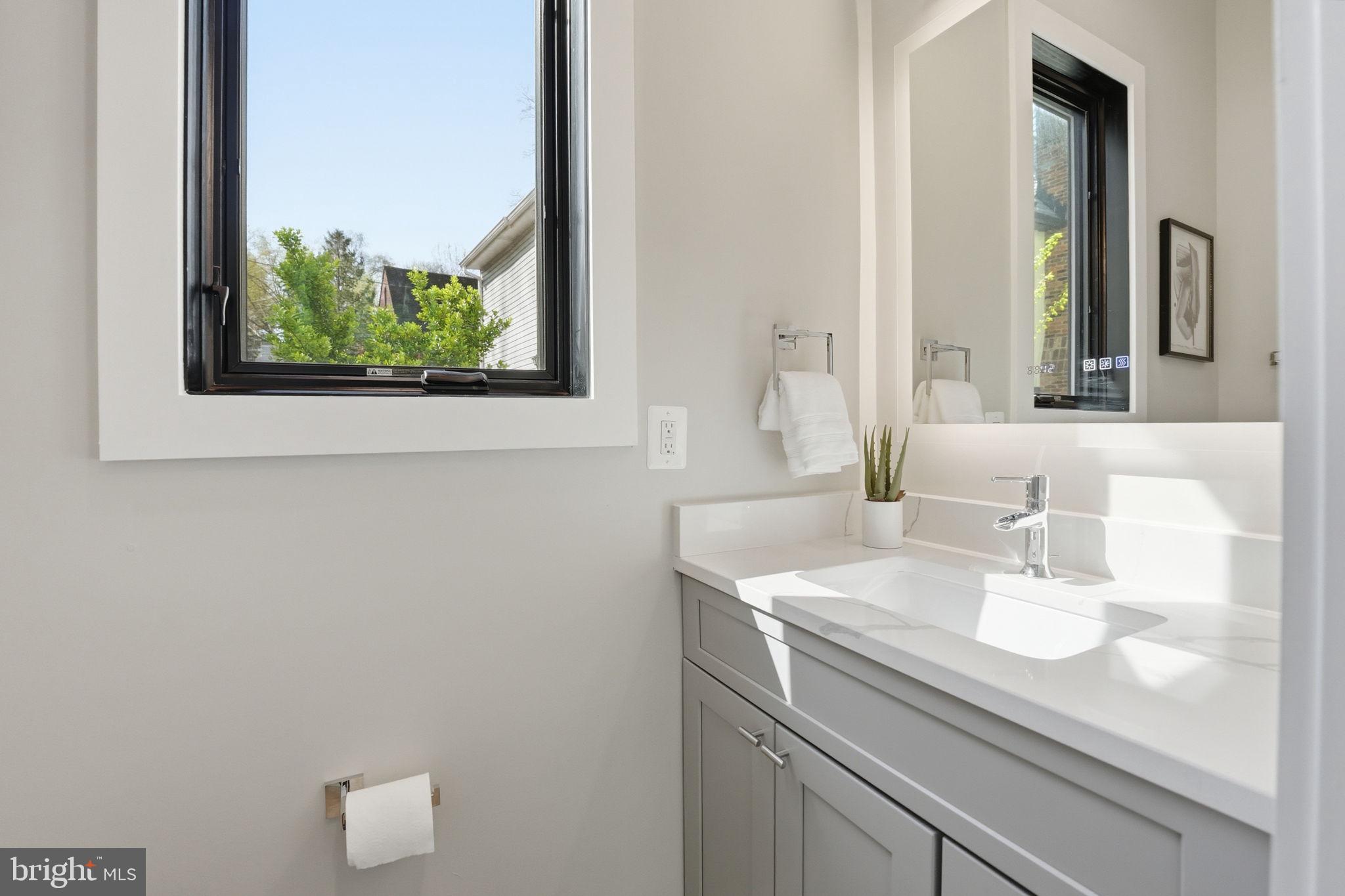 2211 Military Road Arlington, VA 22207 - Photo 27 of 107 Bright and airy modern bathroom oasis.
