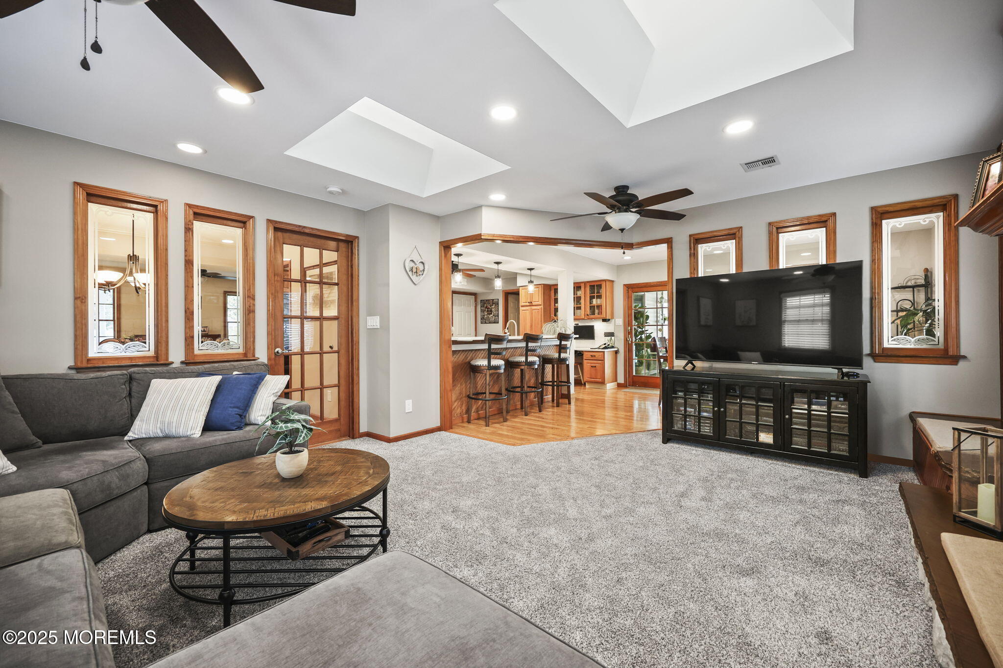 67 Appletree Road Howell, NJ 07731 - Photo 26 of 61 a living room with furniture and a flat screen tv