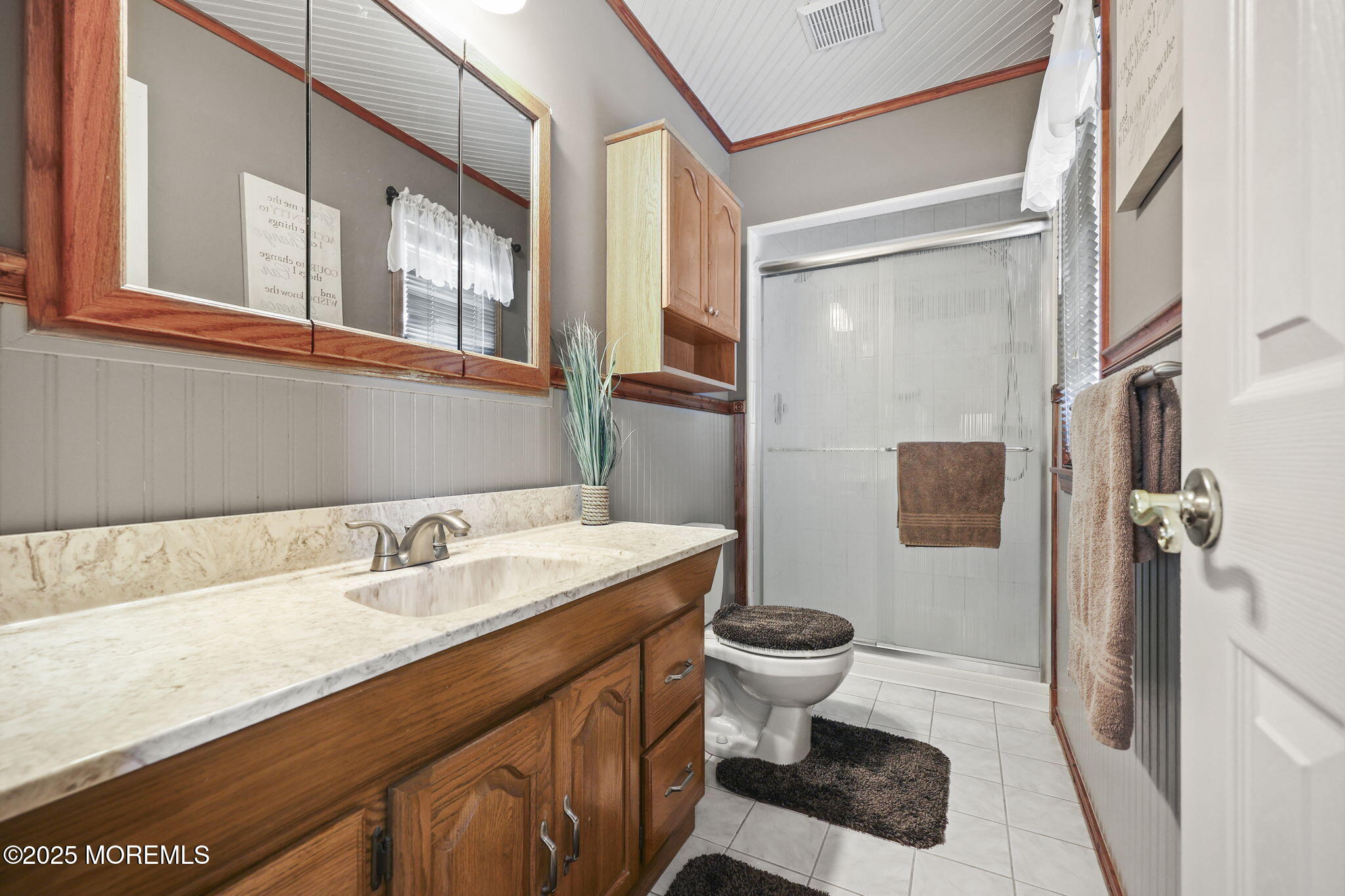 67 Appletree Road Howell, NJ 07731 - Photo 36 of 61 a bathroom with a sink and a mirror