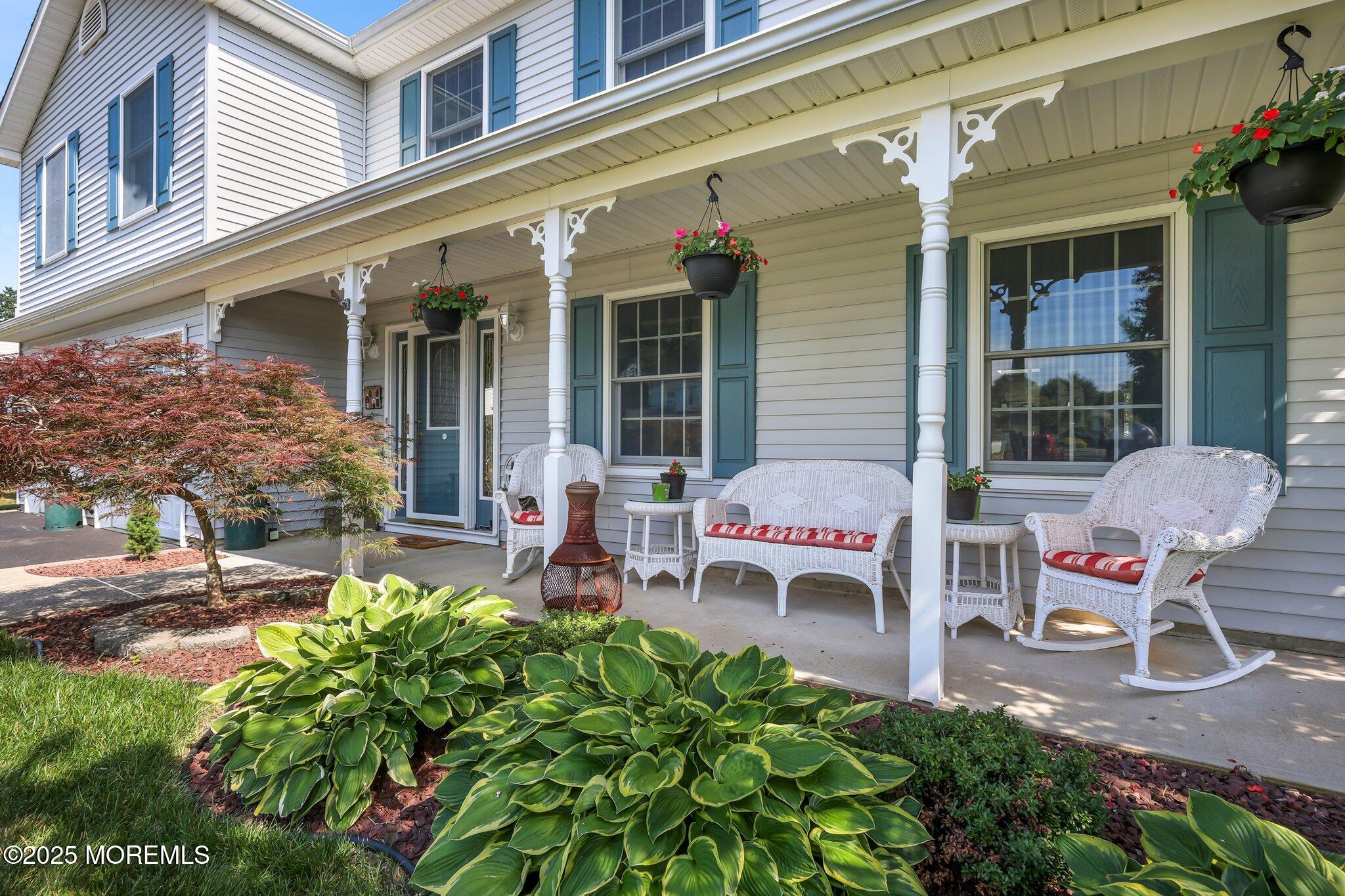 67 Appletree Road Howell, NJ 07731 - Photo 4 of 61 front view of a house with a patio