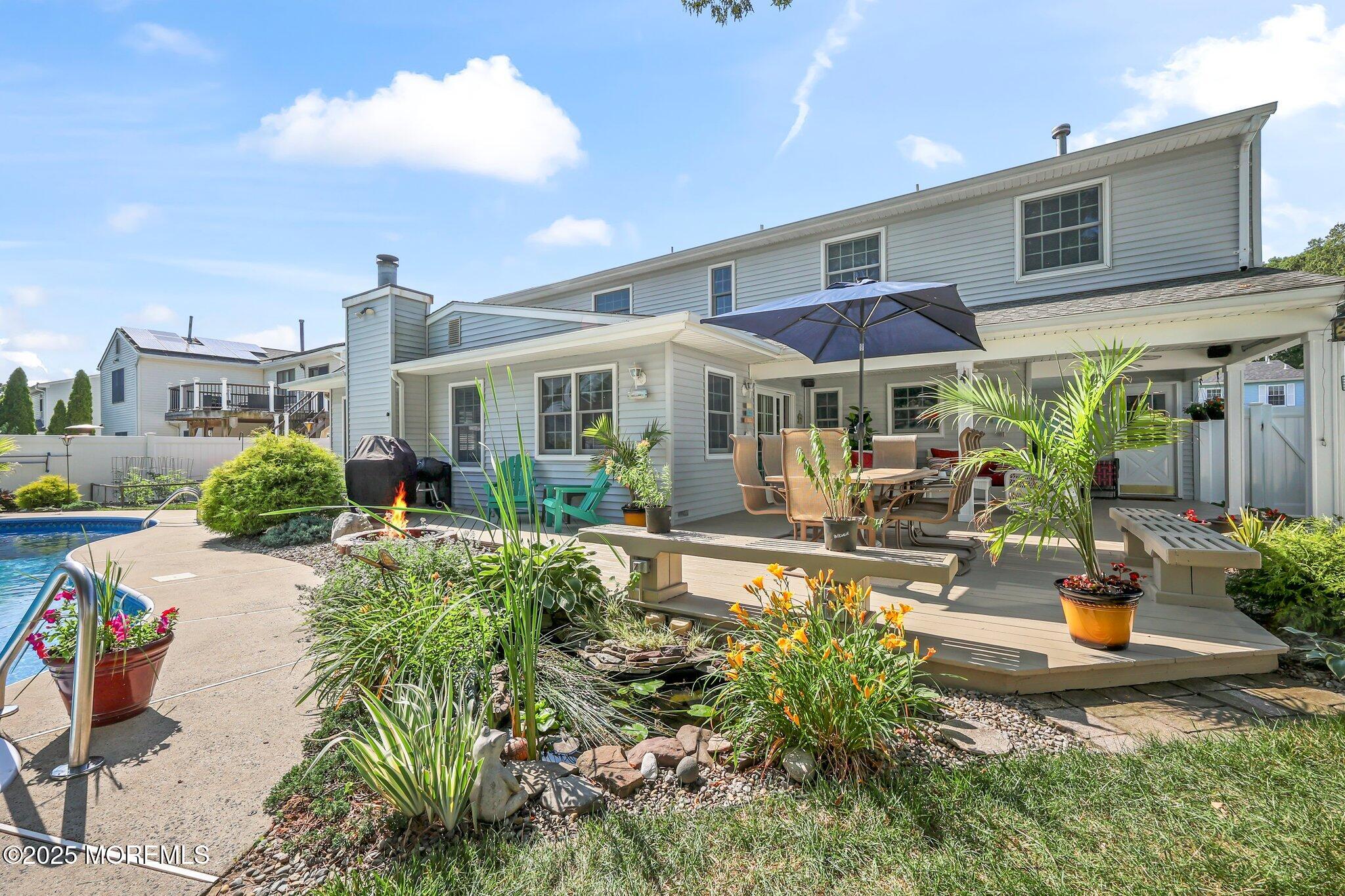 67 Appletree Road Howell, NJ 07731 - Photo 42 of 61 a view of a house with sitting area and furniture