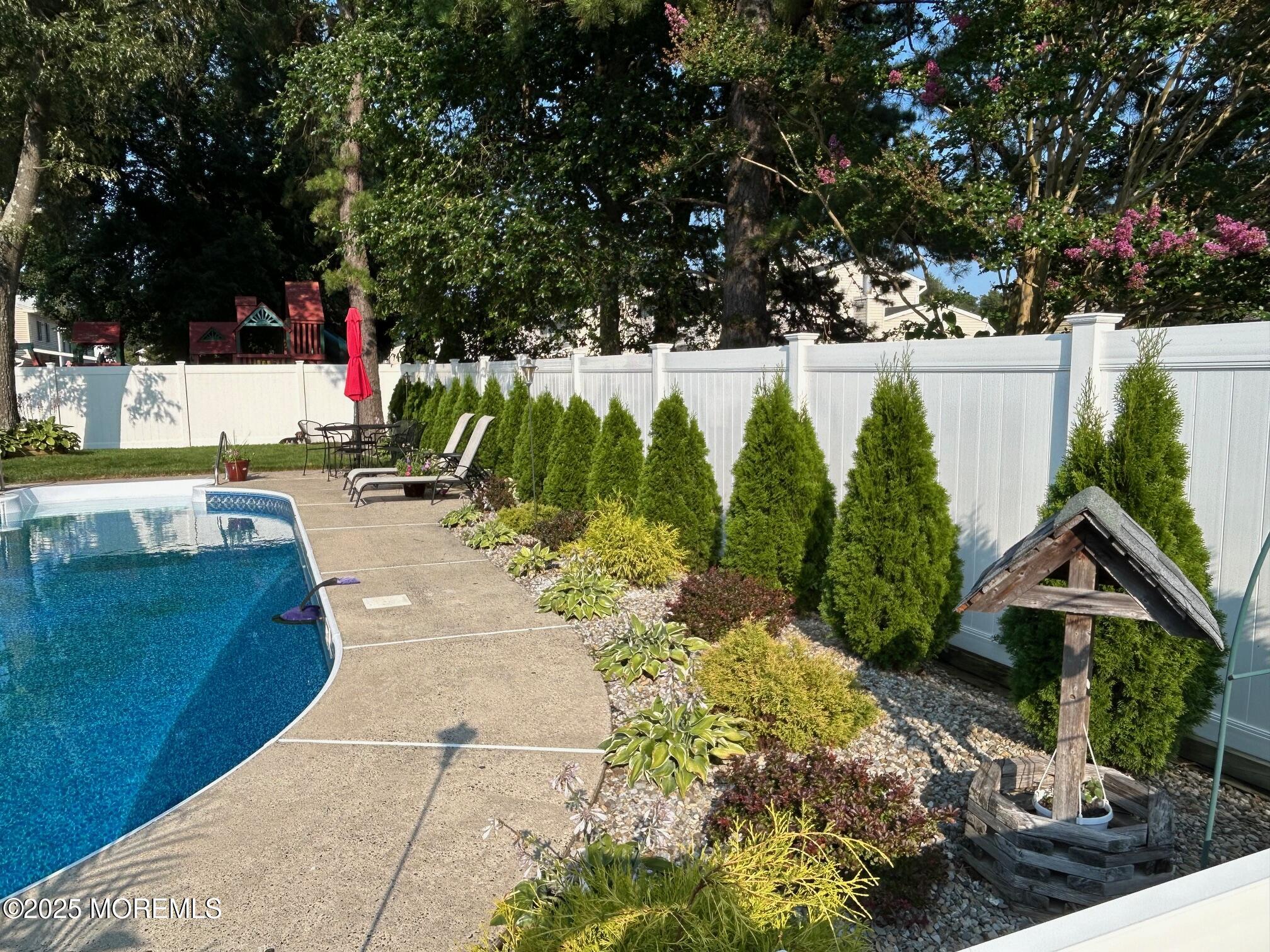 67 Appletree Road Howell, NJ 07731 - Photo 48 of 61 a view of a backyard