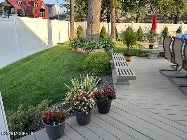 67 Appletree Road Howell, NJ 07731 - Photo 50 of 61 a view of a porch with furniture and flowers