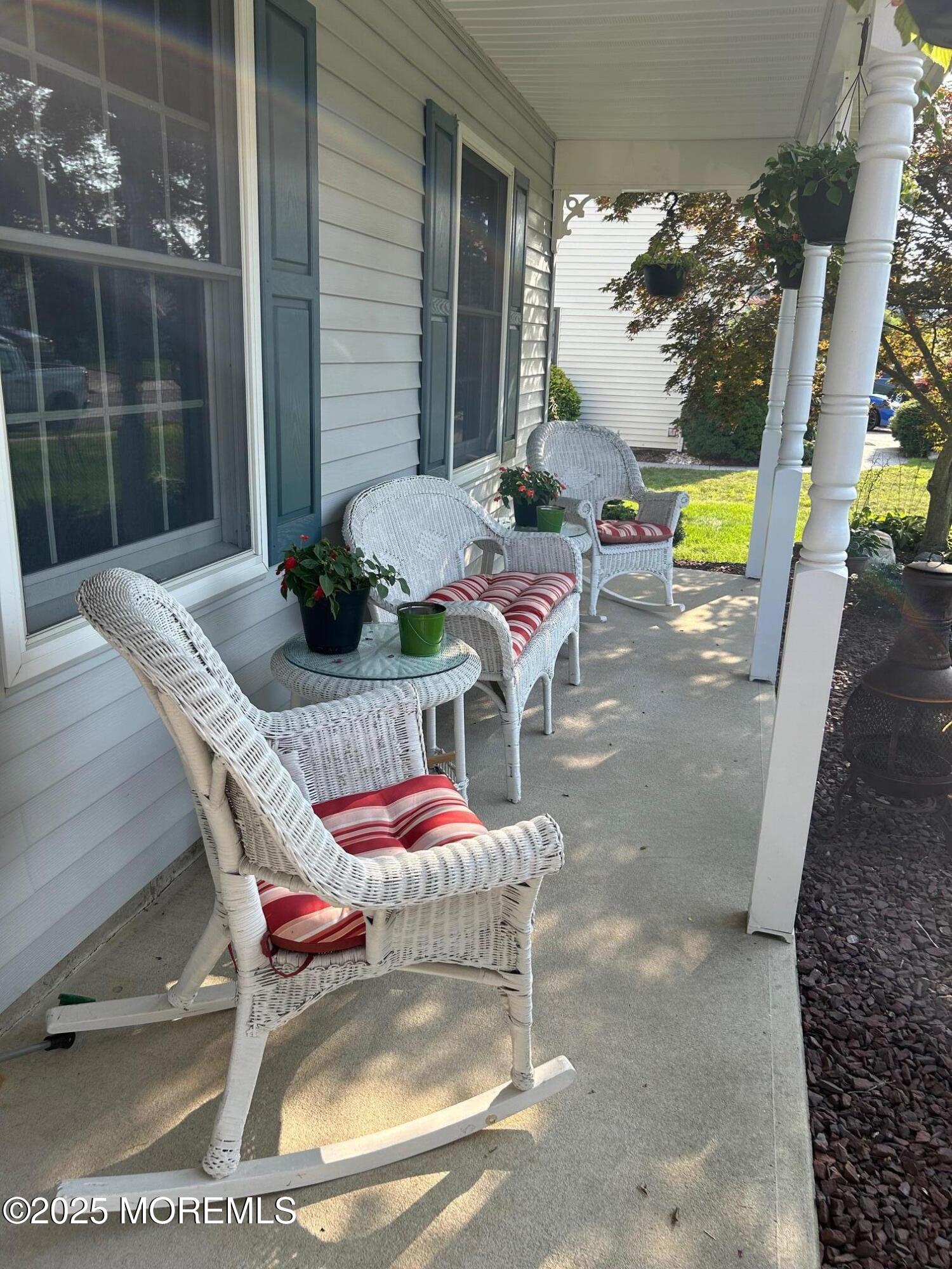 67 Appletree Road Howell, NJ 07731 - Photo 5 of 61 a view of a patio with table and chairs potted plants
