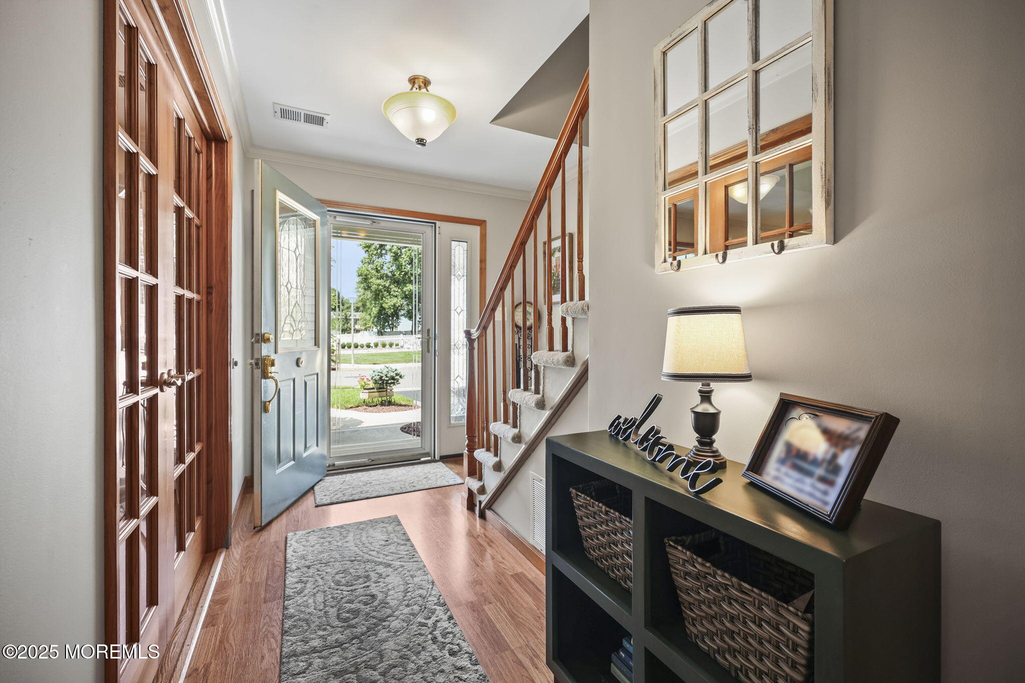 67 Appletree Road Howell, NJ 07731 - Photo 6 of 61 a view of an entryway with wooden floor