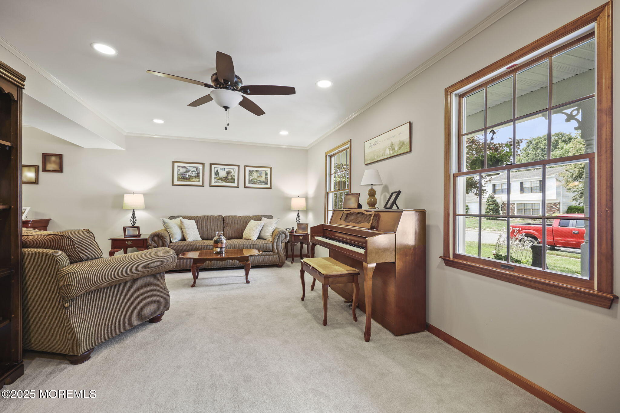 67 Appletree Road Howell, NJ 07731 - Photo 9 of 61 a living room with furniture and a ceiling fan