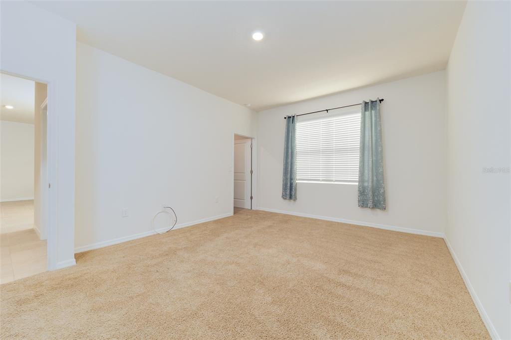 6264 Southwest 89th Ln Road Ocala, FL 34476 - Photo 15 of 22 a view of an empty room with a window