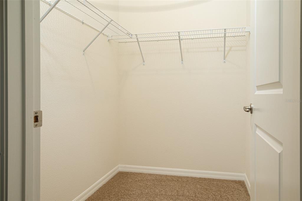 6264 Southwest 89th Ln Road Ocala, FL 34476 - Photo 22 of 22 a view of a room with racks on the wall