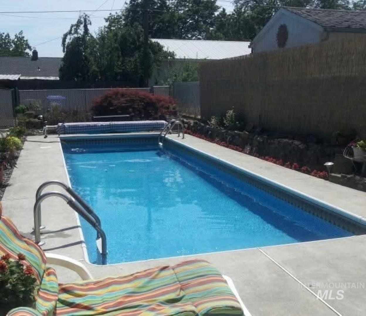 112 17th Avenue Lewiston, ID 83501 - Photo 34 of 40 View of swimming pool with a fenced backyard and a patio