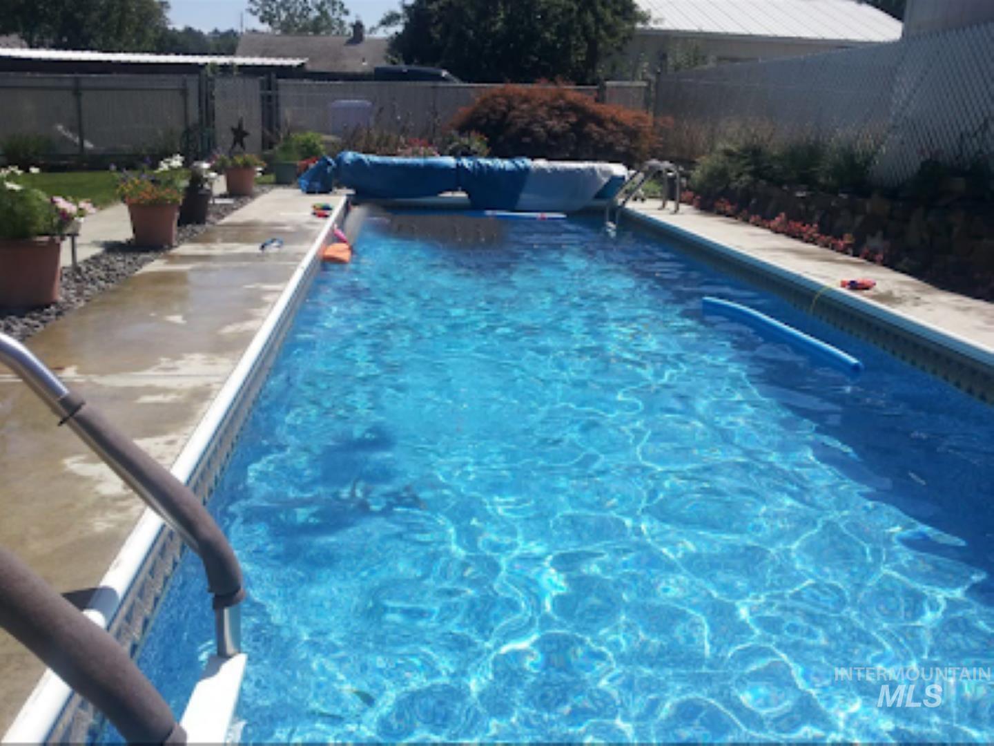 112 17th Avenue Lewiston, ID 83501 - Photo 35 of 40 View of pool featuring a fenced backyard and a patio