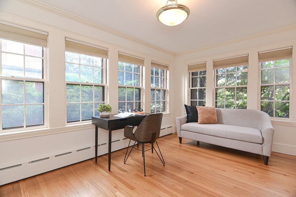 280 Common Street Belmont, MA 02478 - Photo 12 of 36 a living room with furniture and a large window