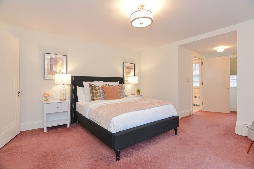280 Common Street Belmont, MA 02478 - Photo 19 of 36 a bed room with a bed and a night stand