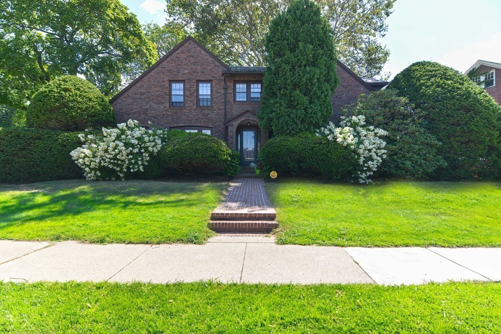 280 Common Street Belmont, MA 02478 - Photo 3 of 36 a front view of a house with a yard